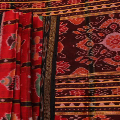 Red and black silk Khandua saree with Nabakothi pattern, styled or draped view showing the overall look.