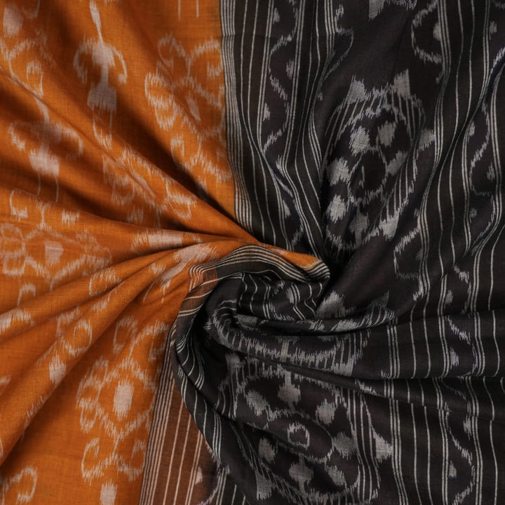 Full layout of the brown and black Sambalpuri cotton saree displaying the complete body and pallu design.