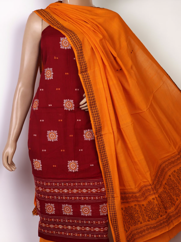 Bomkai cotton dress material blouse piece in maroon, featuring a subtle butta pattern.