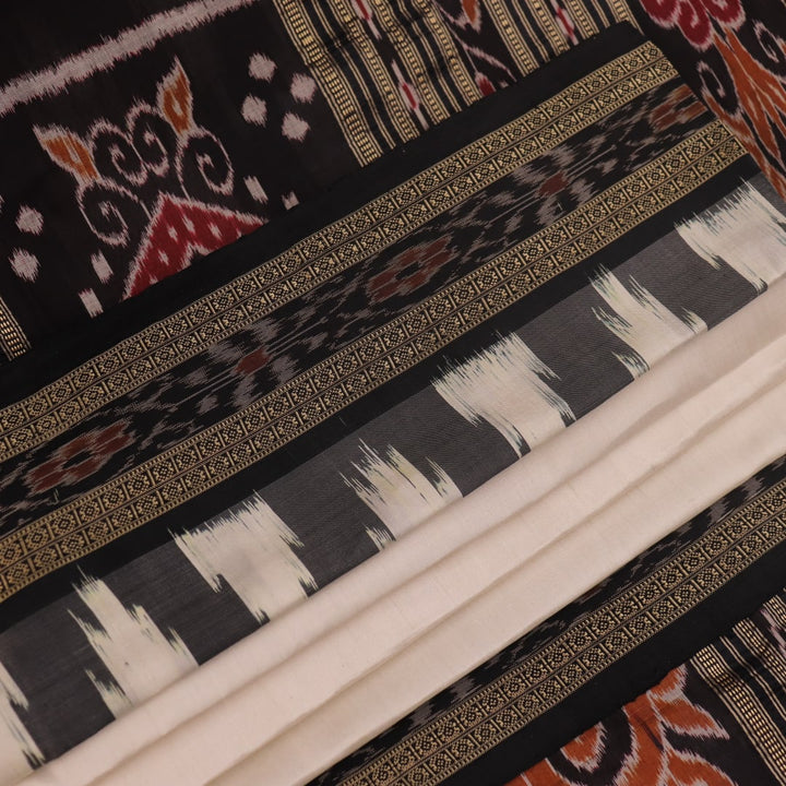 White Khandua silk saree draped, showcasing its plain body and simple elegance.