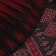 Gracefully draped maroon and black plain Sambalpuri cotton saree.