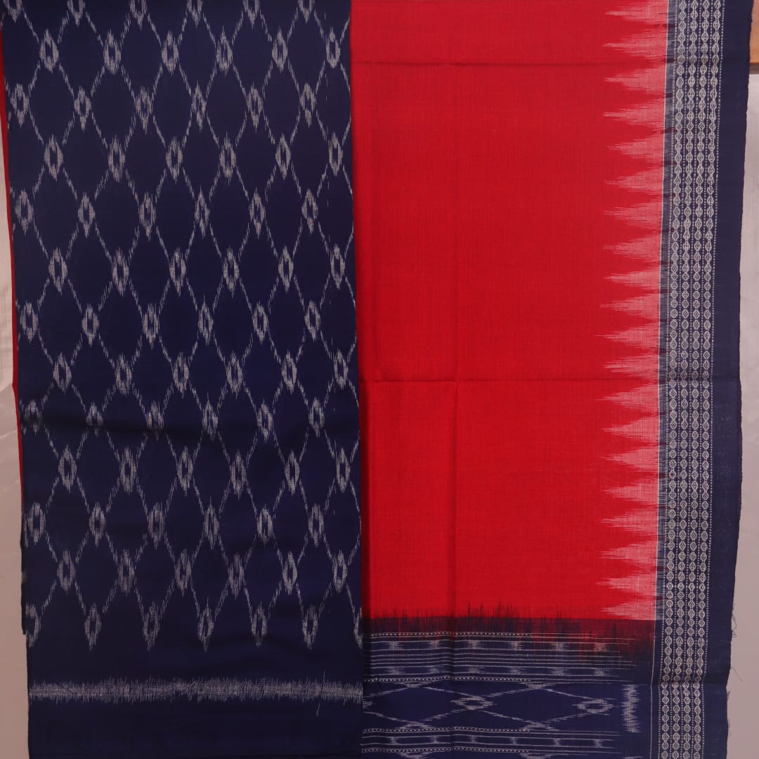 Detail of blue and red Sambalpuri cotton dress material blouse piece with motifs.