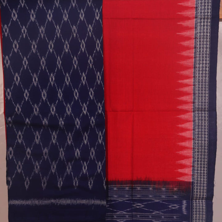 Detail of blue and red Sambalpuri cotton dress material blouse piece with motifs.
