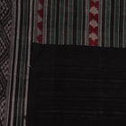 Full view of a green and black Sambalpuri cotton saree with motifs.