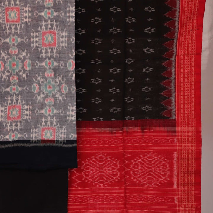 Close-up of blouse piece, showcasing grey cotton with black Sambalpuri motifs