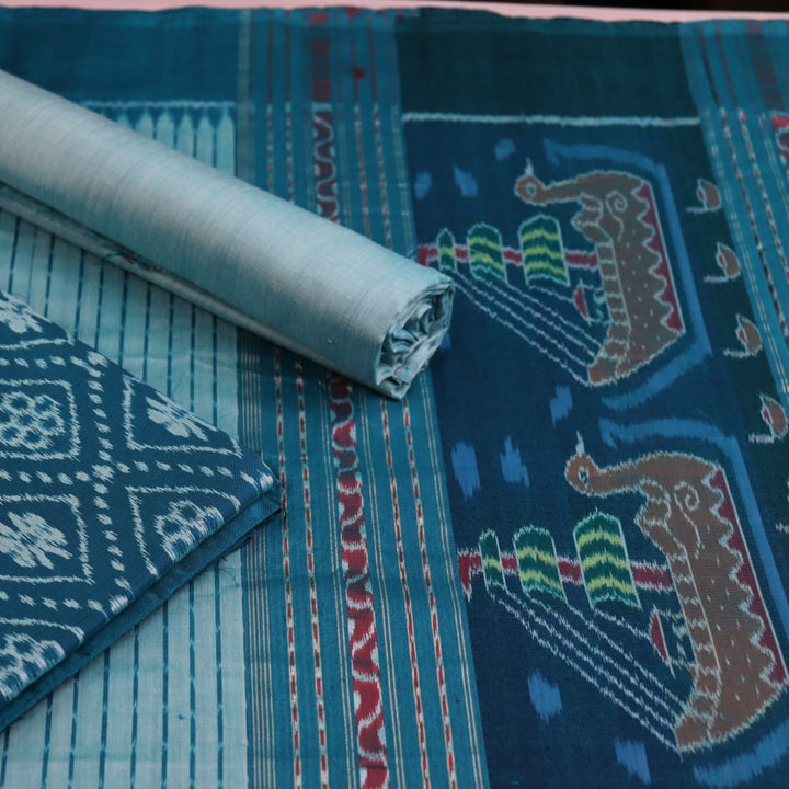 Detail of blue Sambalpuri silk dress material blouse piece with motifs.