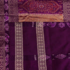 Close-up of the smooth, lustrous texture of multi-color and violet Bomkai silk saree, featuring butta weave.