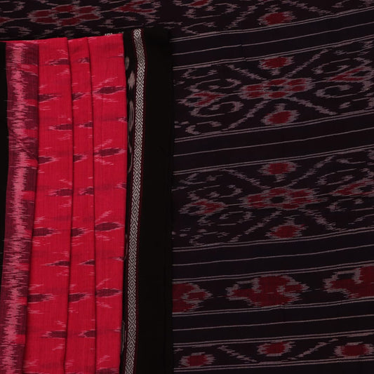 Pink and black cotton Sambalpuri saree with intricate motifs draped in a traditional style.