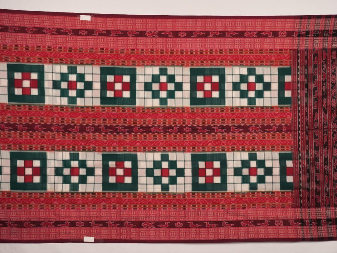 Model draped in a green and maroon pasapalli Sambalpuri cotton saree for a traditional ethnic look.