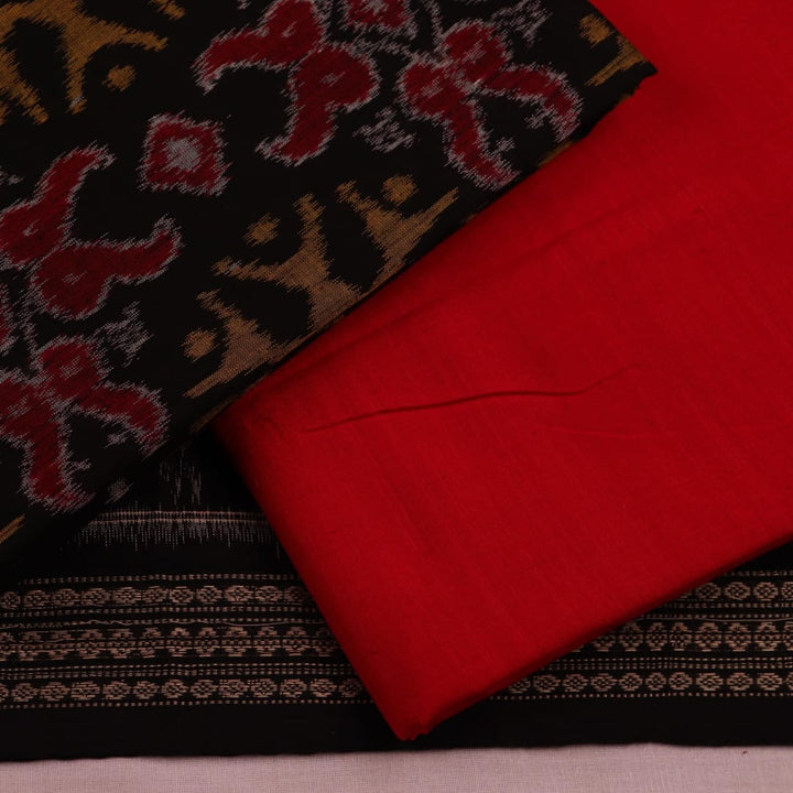 Detailed view of the red and black motifs on the cotton Sambalpuri dress material (Image 4 of 7)