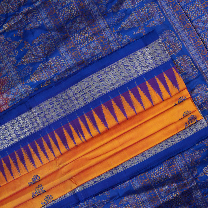 Close-up of Bomkai Silk Saree fabric texture and handloom weave in orange and blue threads.
