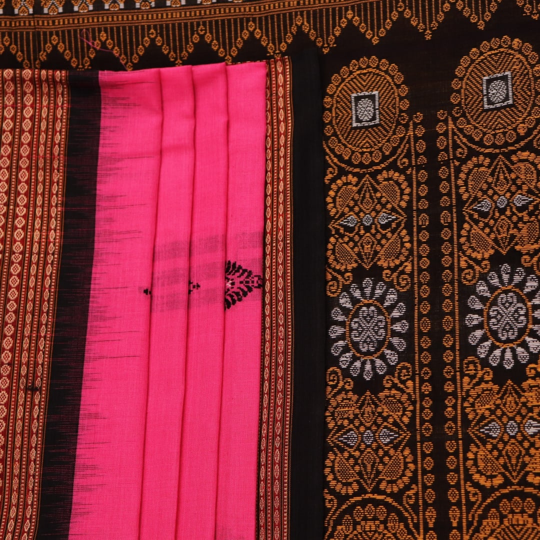 Full view of a pink and black cotton Bomkai saree with a Butta pattern.