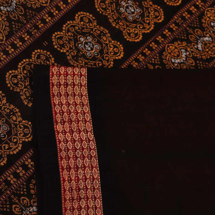 Full view of a Bomkai cotton saree in orange with black butta pattern