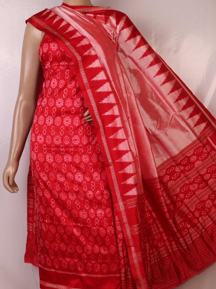 Detail of red and peach Sambalpuri Silk dress material blouse piece with motifs.