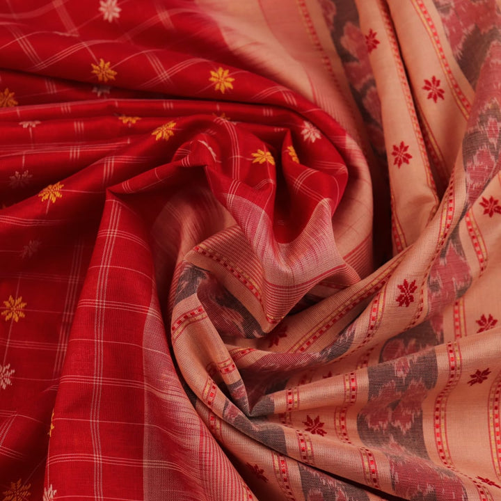 Full body view of a vibrant red cotton Sambalpuri saree featuring intricate butta patterns and a cream border.