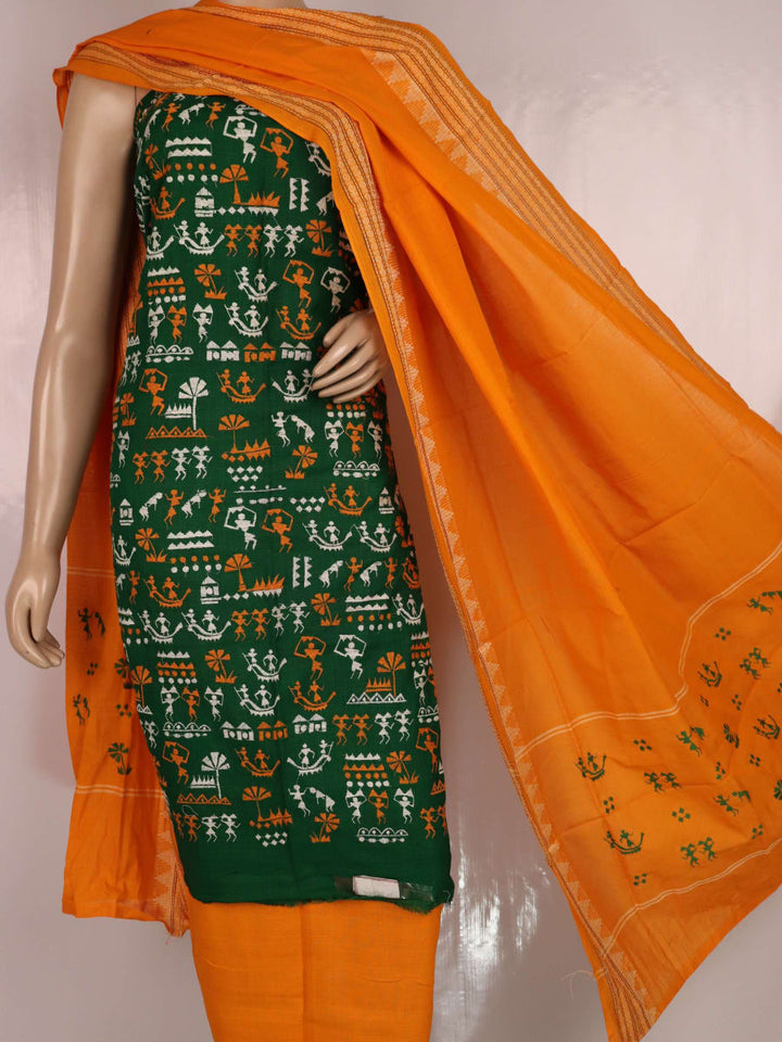 Close-up of green Sambalpuri handloom dress material with a yellow doll pattern