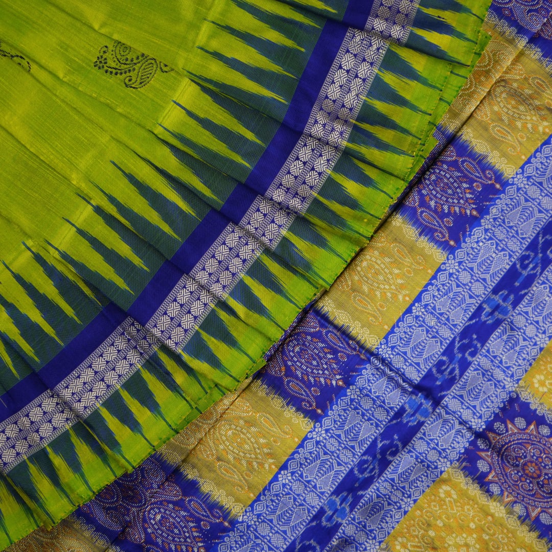 Detailed close-up of the exquisite green Bomkai Silk Saree fabric, highlighting its luxurious silk weave.