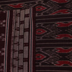 Elegantly draped grey Sambalpuri cotton saree with maroon motifs.