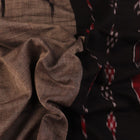 Styled view of a plain grey and black Sambalpuri cotton handloom saree.