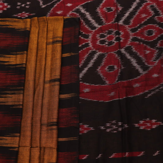 Brown and black plain Sambalpuri cotton saree styled, showcasing its elegant drape and subtle colors.