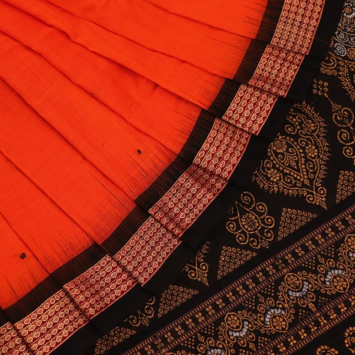 Full view of a Bomkai cotton saree in orange with black butta pattern