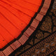 Full view of a Bomkai cotton saree in orange with black butta pattern