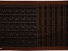 Full view of a black and black cotton Sambalpuri saree with intricate motif patterns.