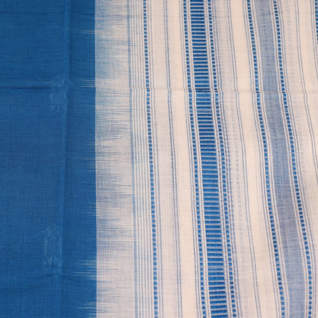 Styling view of a blue and white cotton Sambalpuri dupatta with buta pattern