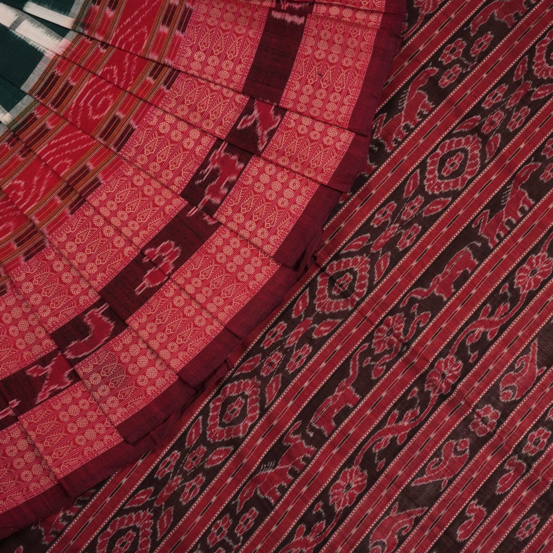 Model draped in a green and maroon pasapalli Sambalpuri cotton saree for a traditional ethnic look.