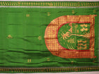 Close-up of green Patachitra silk saree, showcasing the handloom weave and fabric texture.