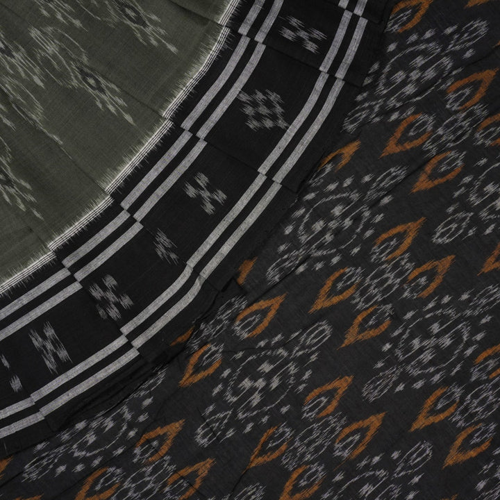 Elegant model drape of the grey and black Sambalpuri cotton saree showcasing traditional handloom motifs.