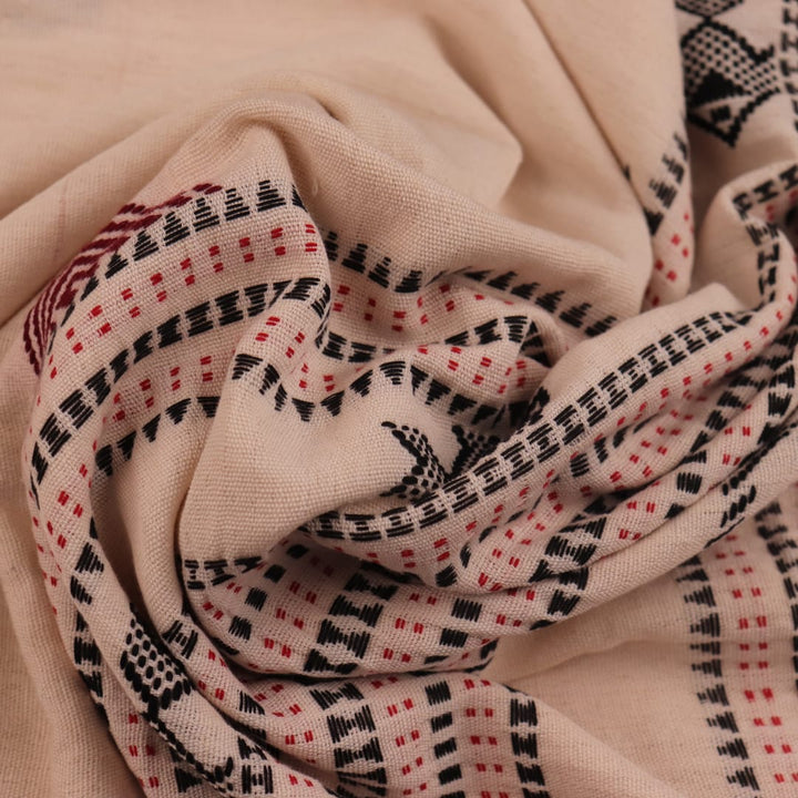 Full view of a white cotton Kotpad saree with a maroon border and butta pattern