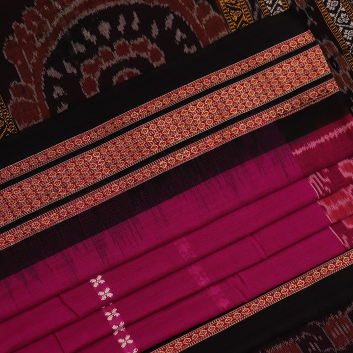 A full-length view of a vibrant magenta cotton Bomkai saree adorned with intricate black motifs.