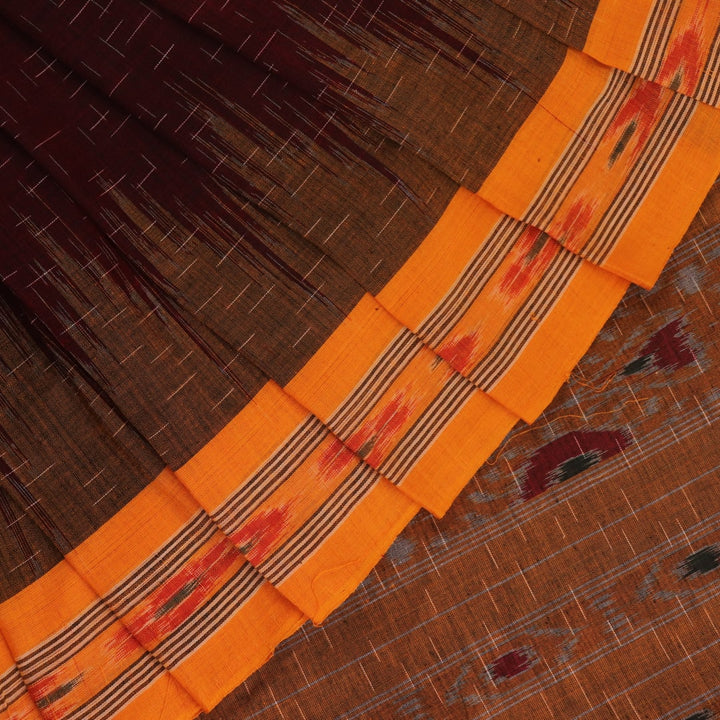 Styling view of a plain maroon and yellow Sambalpuri cotton saree.