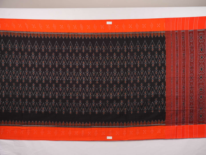 Elegant model styling of a black and orange Sambalpuri cotton saree showcasing the complete handloom look.