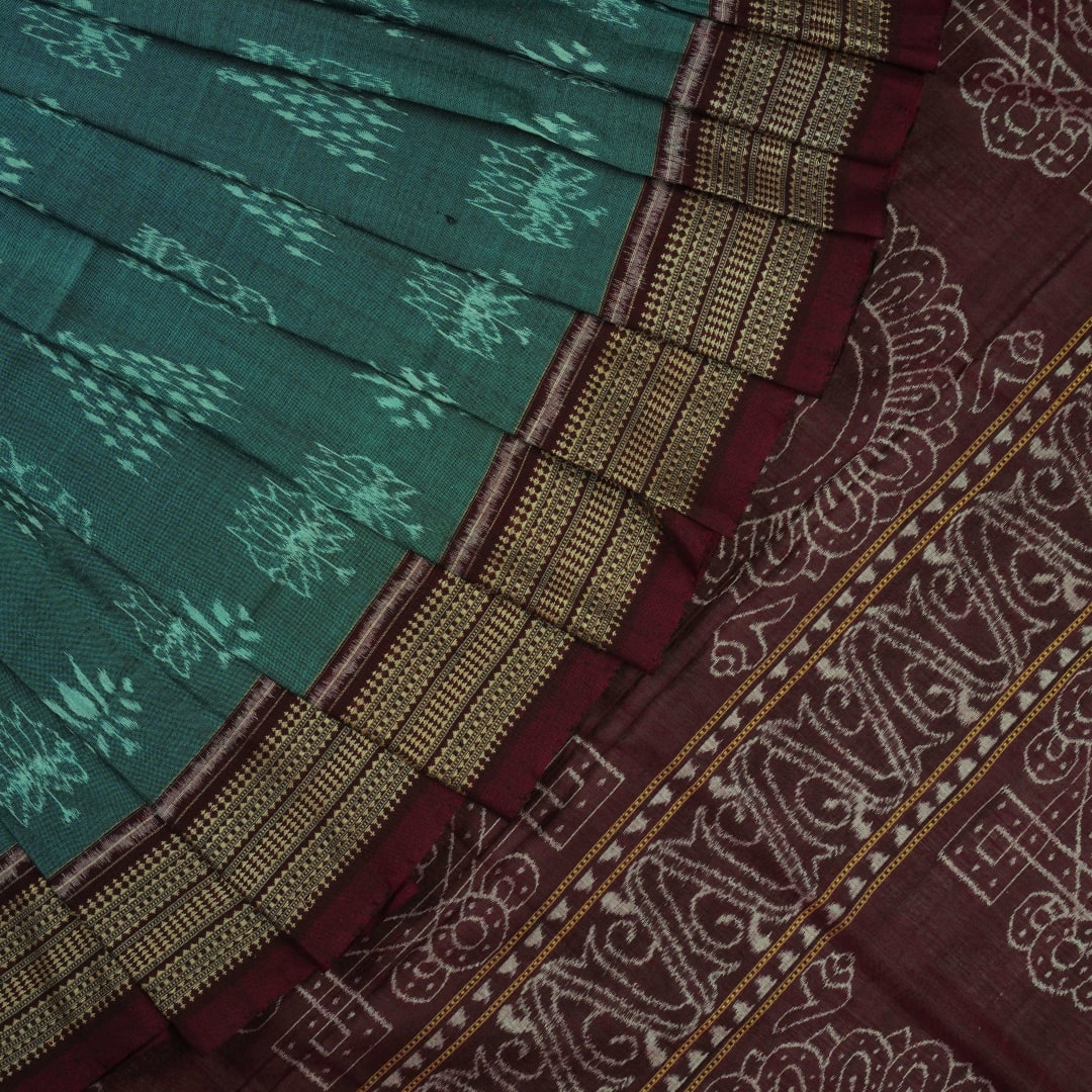 Full flat layout of green and maroon Sambalpuri cotton saree showcasing the complete body and pallu motifs.
