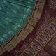 Full flat layout of green and maroon Sambalpuri cotton saree showcasing the complete body and pallu motifs.