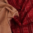 Draped plain cream and maroon Sambalpuri cotton saree.