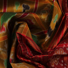 Green Khandua silk saree styled and draped to showcase the Nabakothi pattern, a traditional handloom saree.