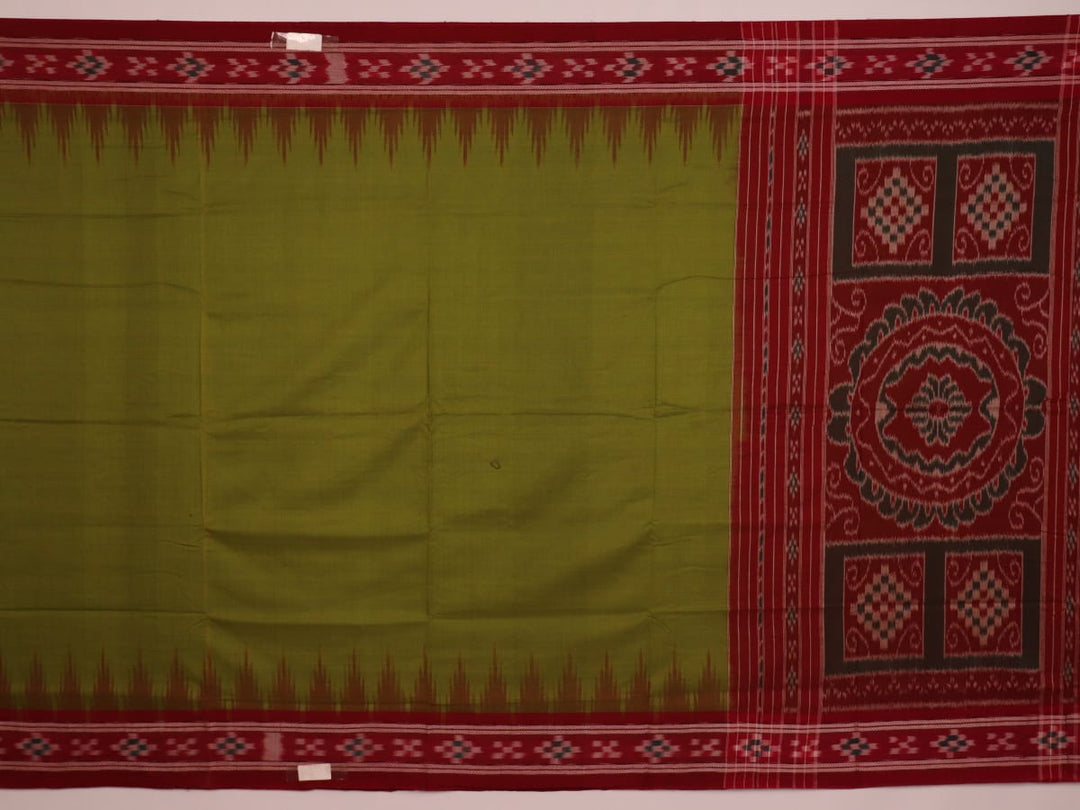 Green and maroon cotton Sambalpuri saree draped on a model, showcasing the Pasapalli pattern.