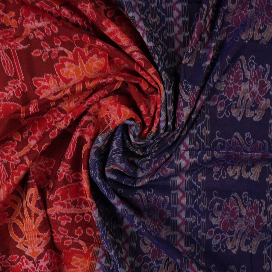 Full flat layout of maroon and blue Sambalpuri cotton saree with traditional motifs and ikat border.