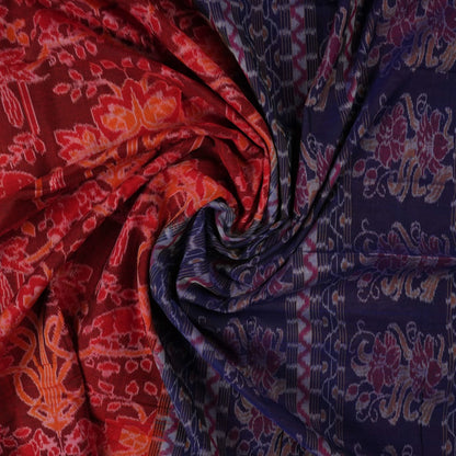 Full flat layout of maroon and blue Sambalpuri cotton saree with traditional motifs and ikat border.