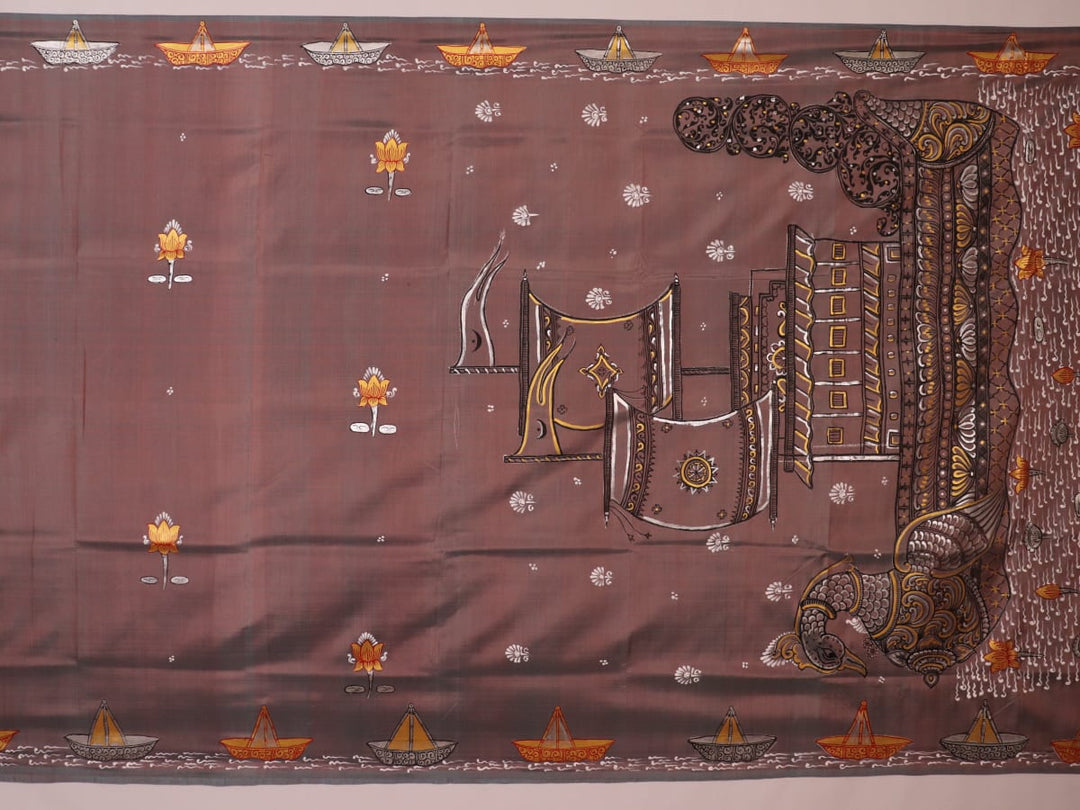 Close-up of multicolored Patachitra silk saree fabric texture showing hand-painted details.