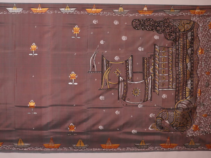 Close-up of multicolored Patachitra silk saree fabric texture showing hand-painted details.