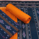 Close-up of the blue and yellow Sambalpuri cotton dress material blouse piece with motifs.
