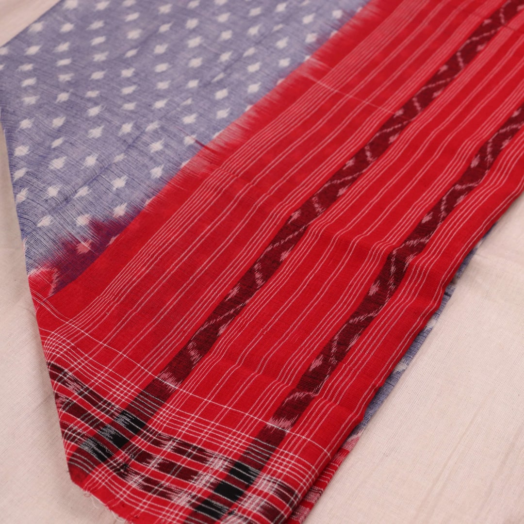 Grey and red Sambalpuri cotton dupatta styled in a draped view