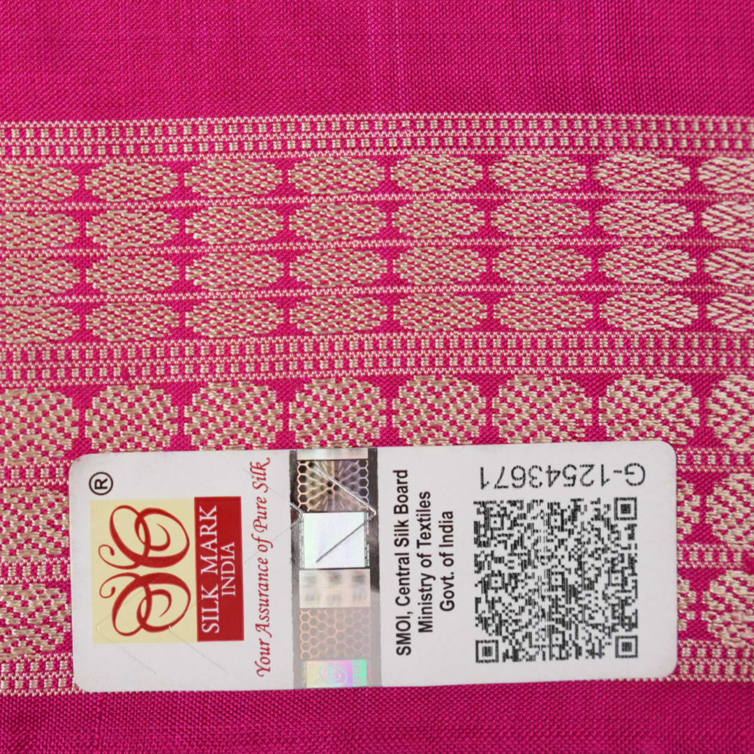 Close-up of the Bomkai Silk Saree's yellow fabric, revealing its luxurious texture and handloom weave.