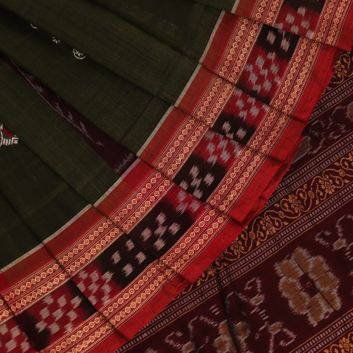 Full view of a green and rust cotton Bomkai saree with traditional butta patterns.