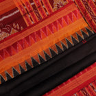 Black Khandua silk saree styled; showcases the drape and overall appearance, highlighting the red butta pattern.