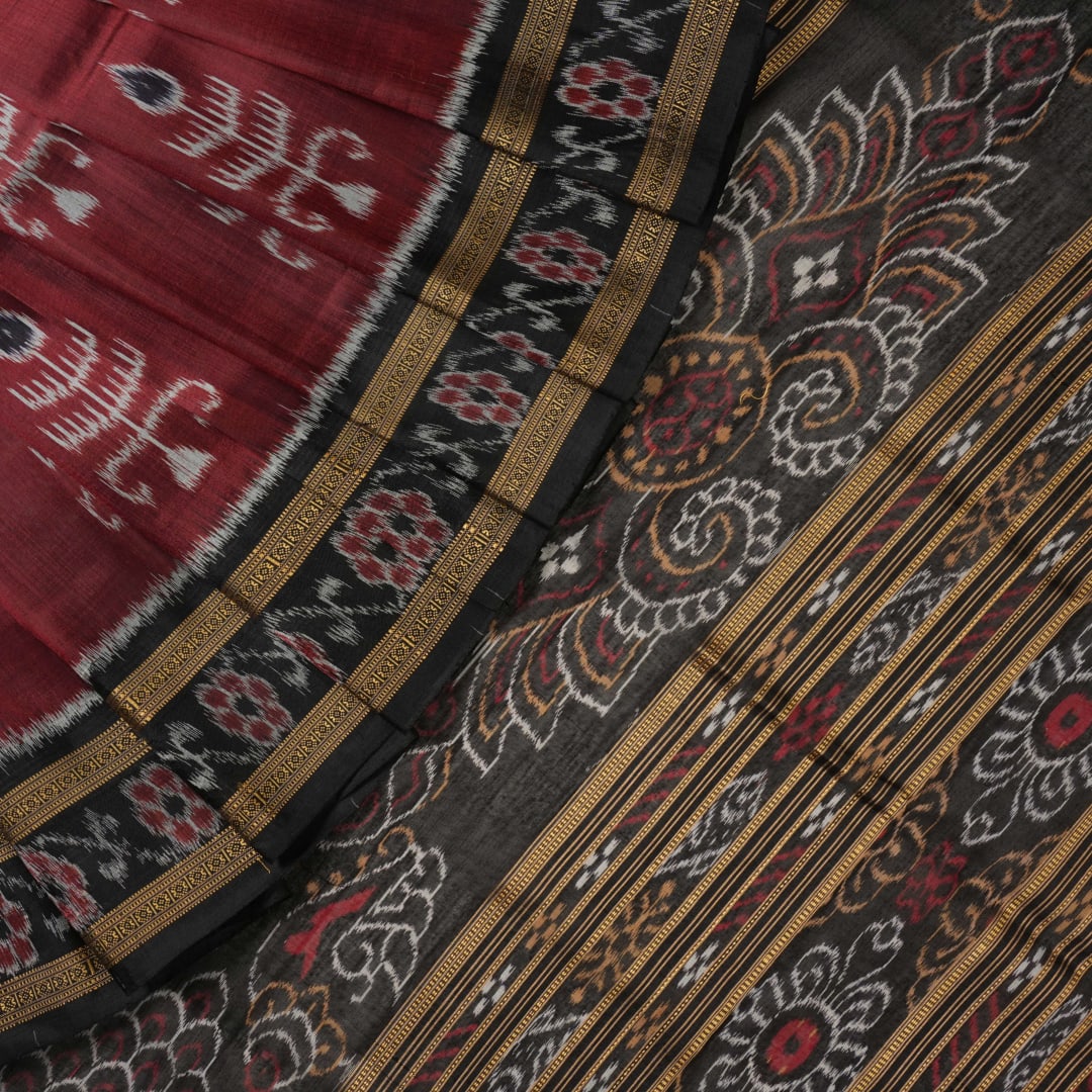 Full styling view of an elegant brown and black Khandua silk saree draped on a model for a classic look.